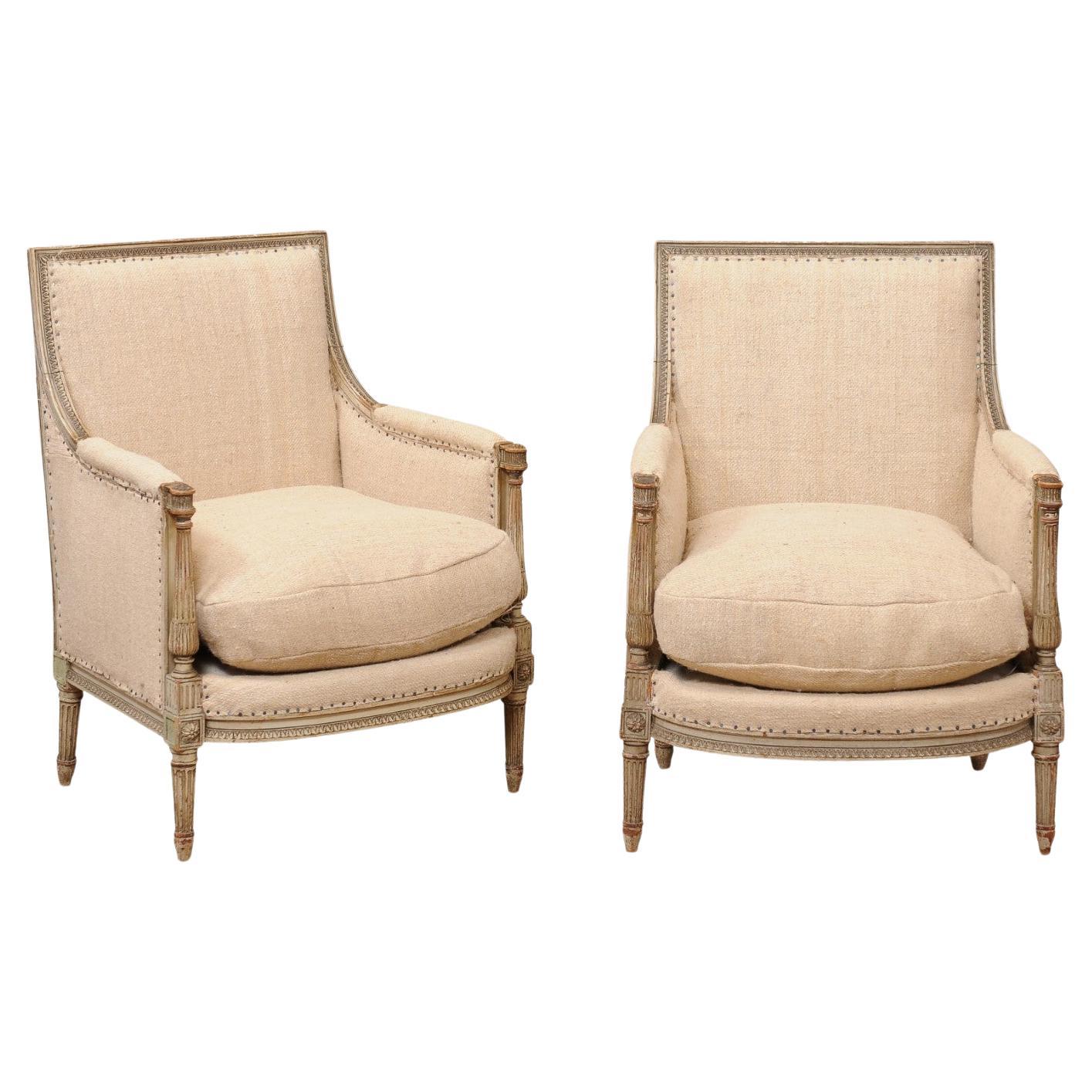 Pair of French Louis XVI Style Painted Bergeres with Linen Upholstery For Sale