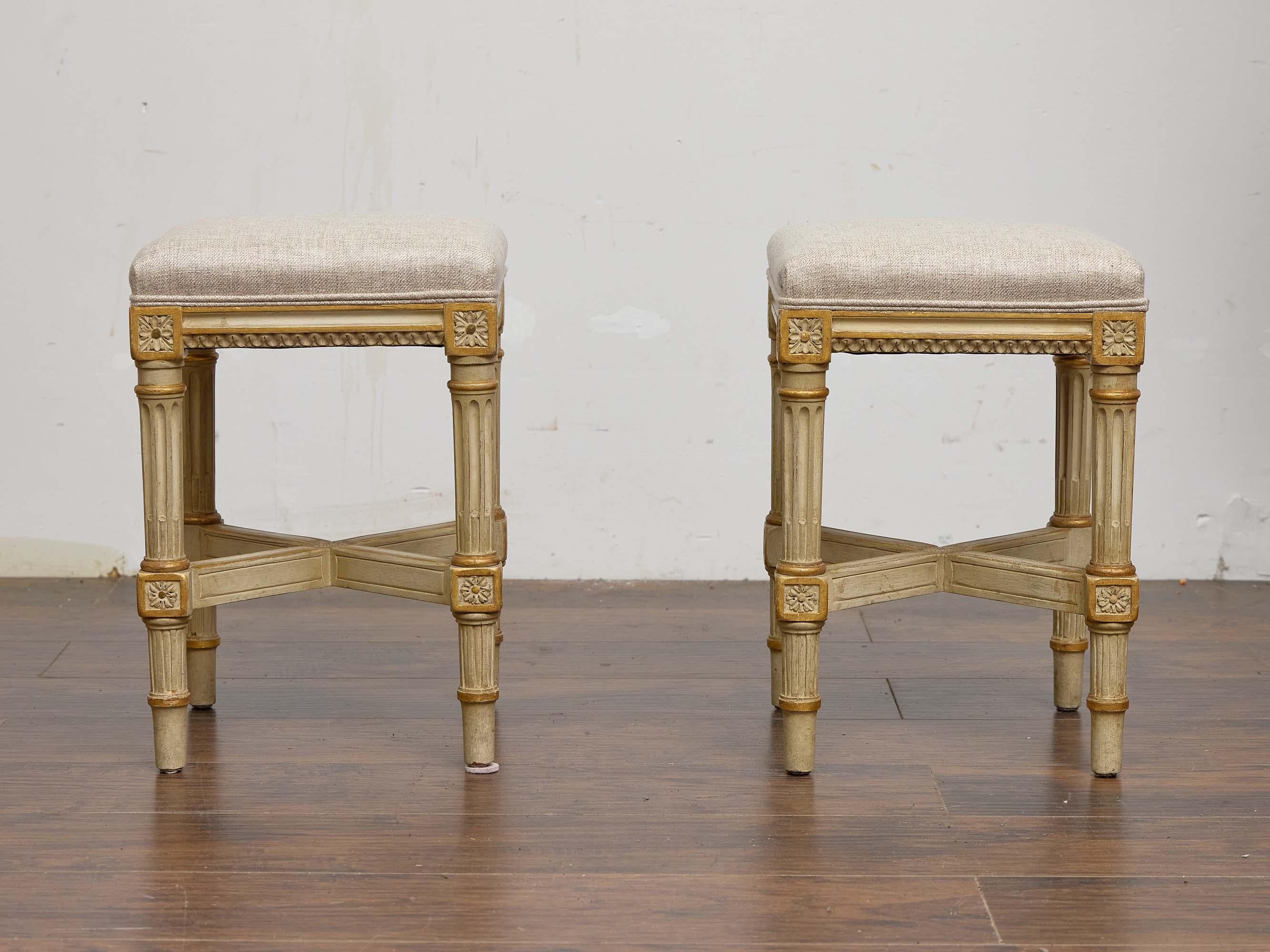 Carved Pair of French Louis XVI-Style Painted Stools with Rosette Carvings, circa 1920 For Sale