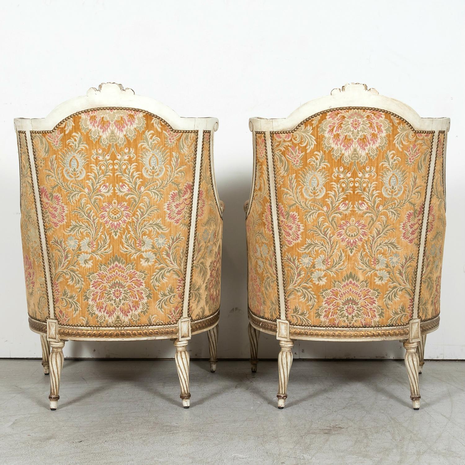 Pair of French Louis XVI Style Parcel Gilt and Painted Maison Jansen Bergeres  For Sale 11