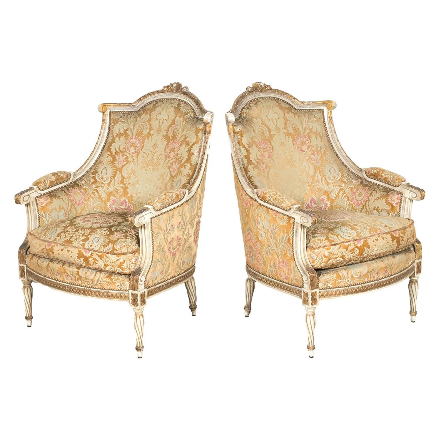 Pair of French Louis XVI Style Parcel Gilt and Painted Maison Jansen Bergeres