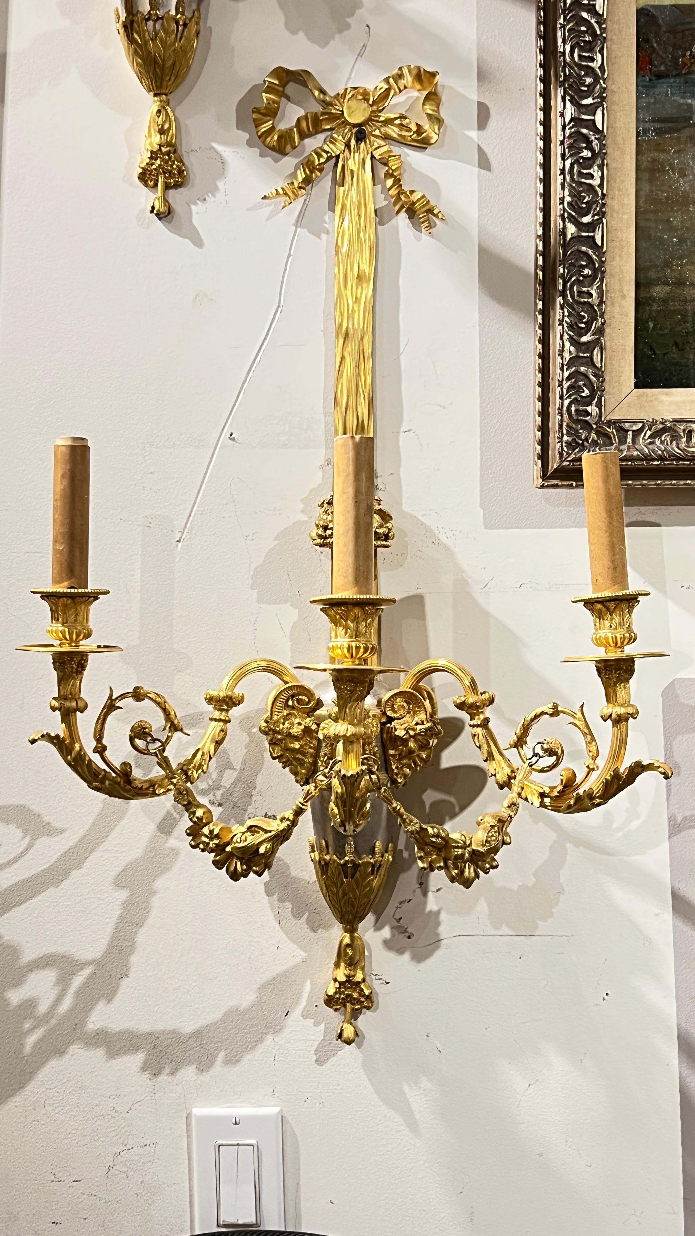 Pair of French Louis XVI Style Silver and Gilt Bronze Sconces In Good Condition For Sale In New York, NY