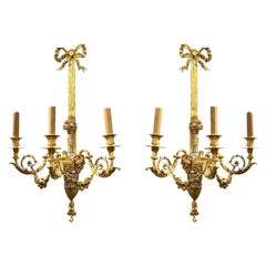Pair of French Louis XVI Style Silver and Gilt Bronze Sconces