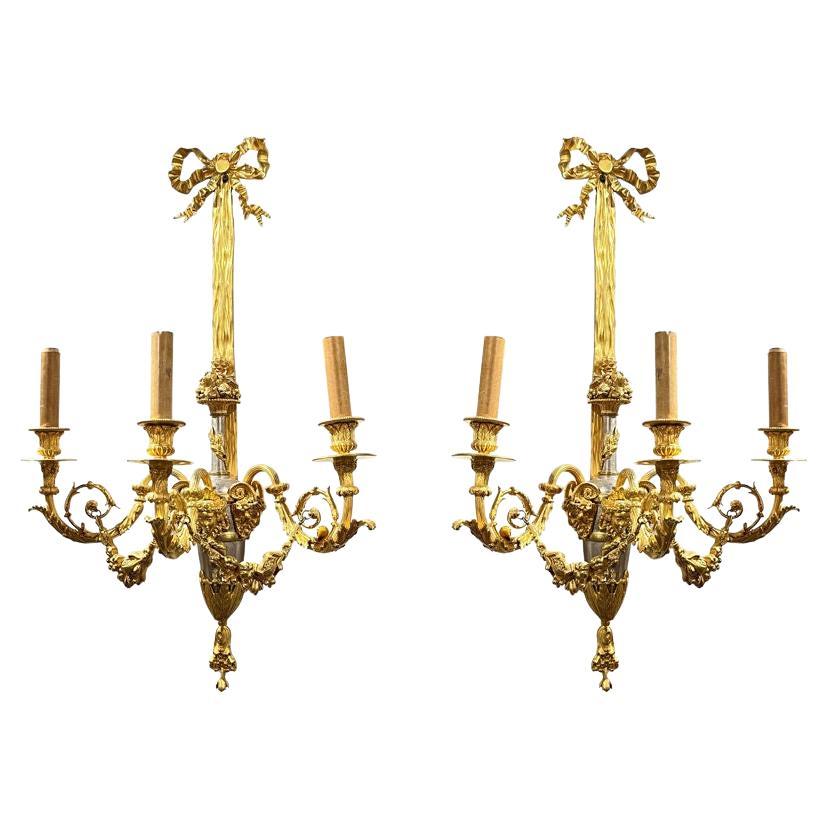 Pair of French Louis XVI Style Silver and Gilt Bronze Sconces For Sale