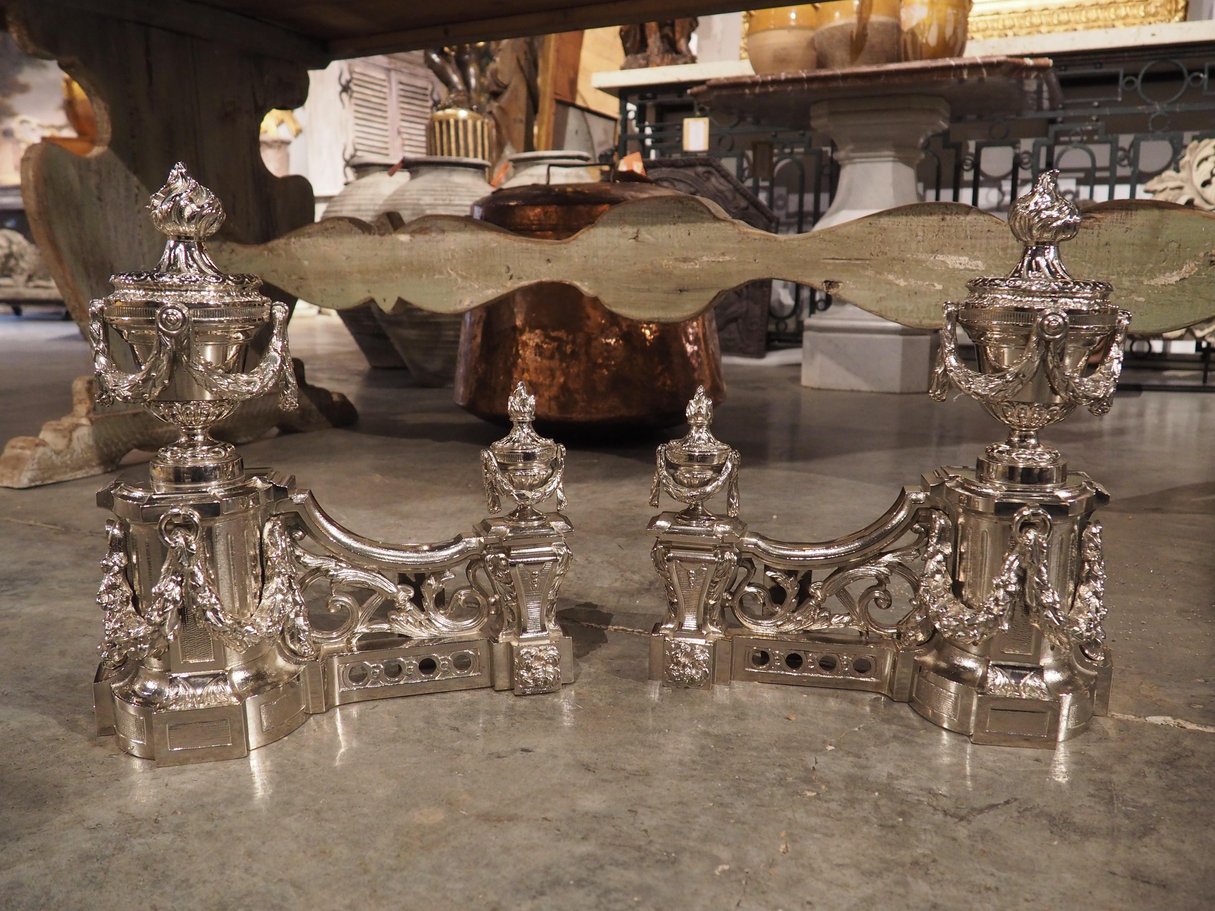 Early 20th Century Pair of French Louis XVI Style Silvered Bronze Chenets, circa 1900 For Sale