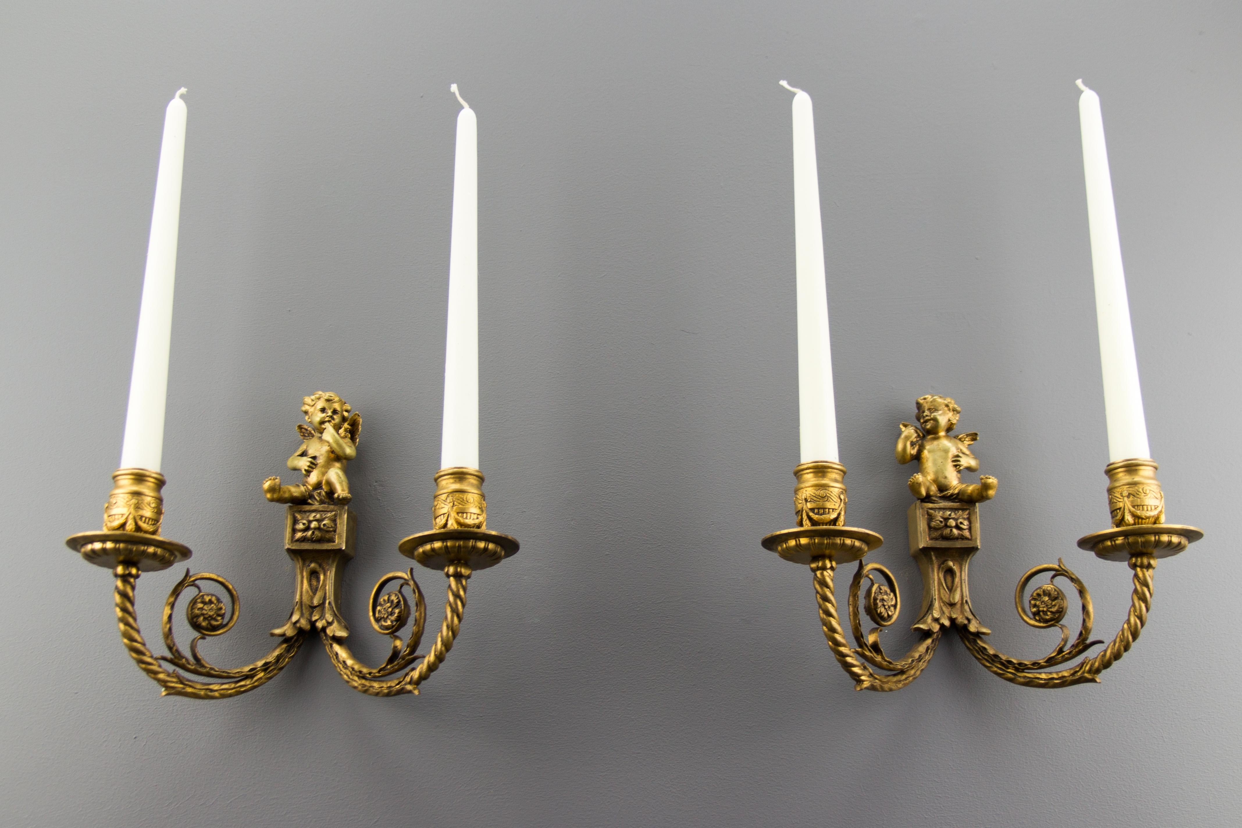 Pair of French Louis XVI Style Twin Arm Bronze Cherub Wall Lights or Sconces In Good Condition In Barntrup, DE