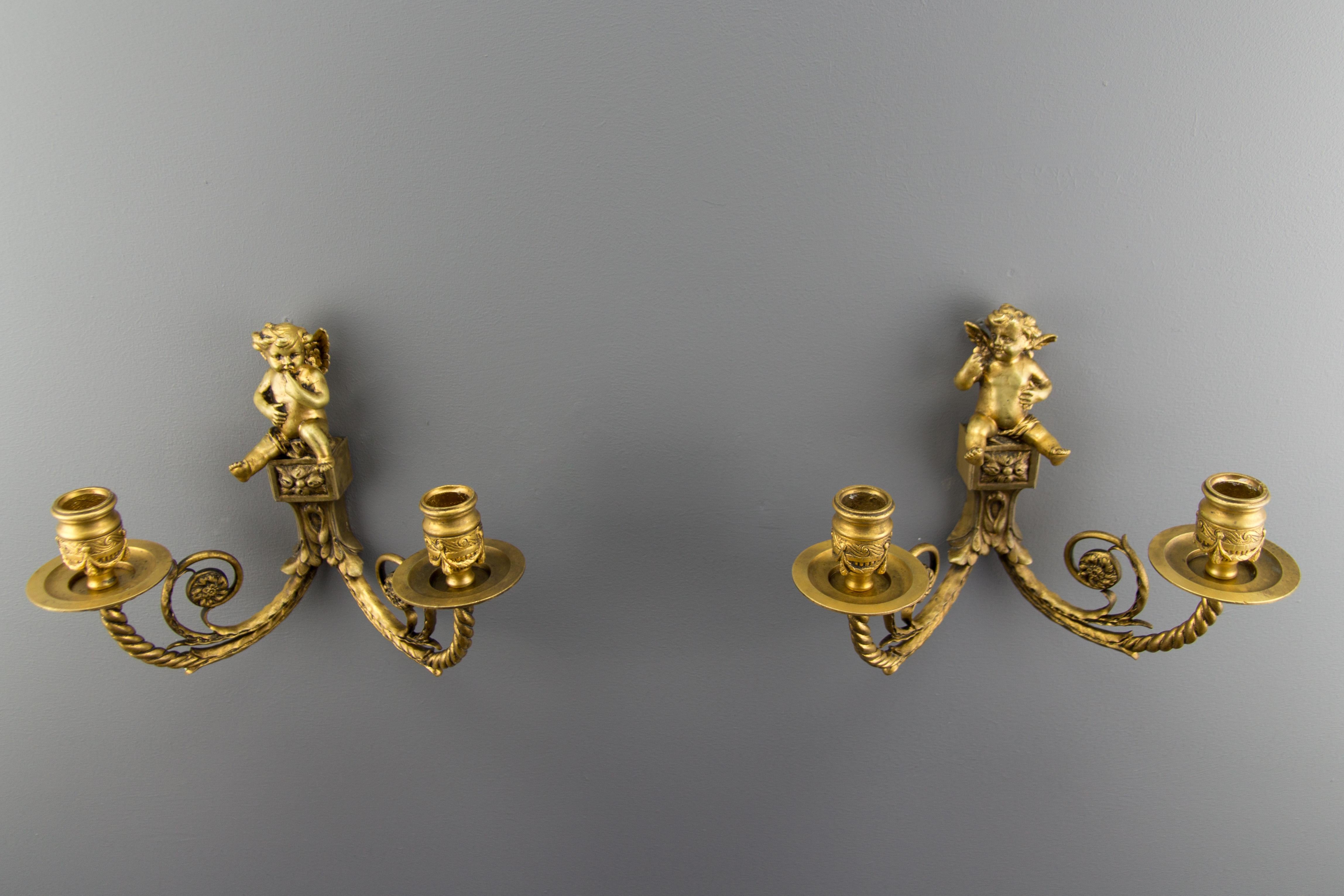 19th Century Pair of French Louis XVI Style Twin Arm Bronze Cherub Wall Lights or Sconces