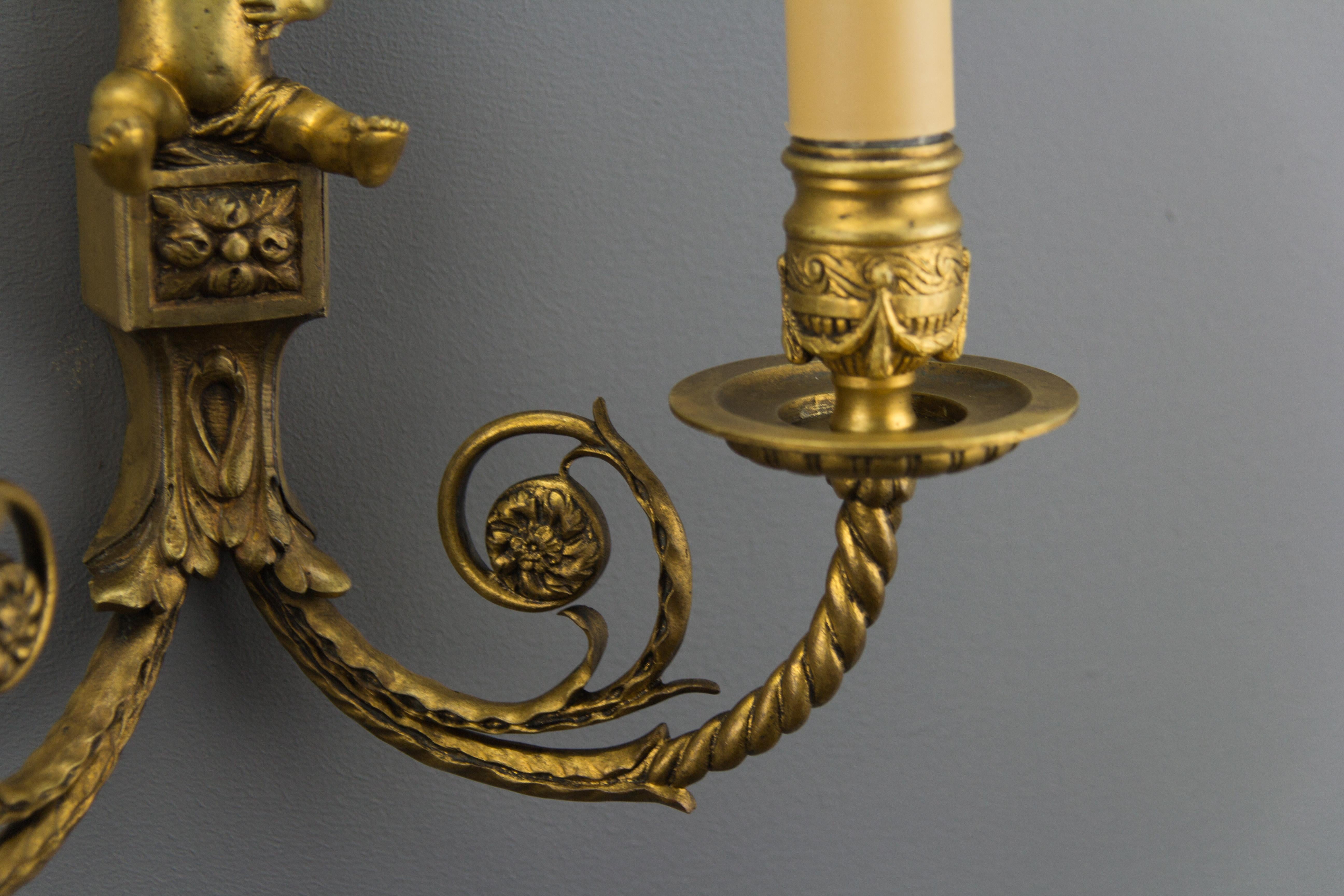 Pair of French Louis XVI Style Twin Arm Bronze Cherub Wall Lights or Sconces 1