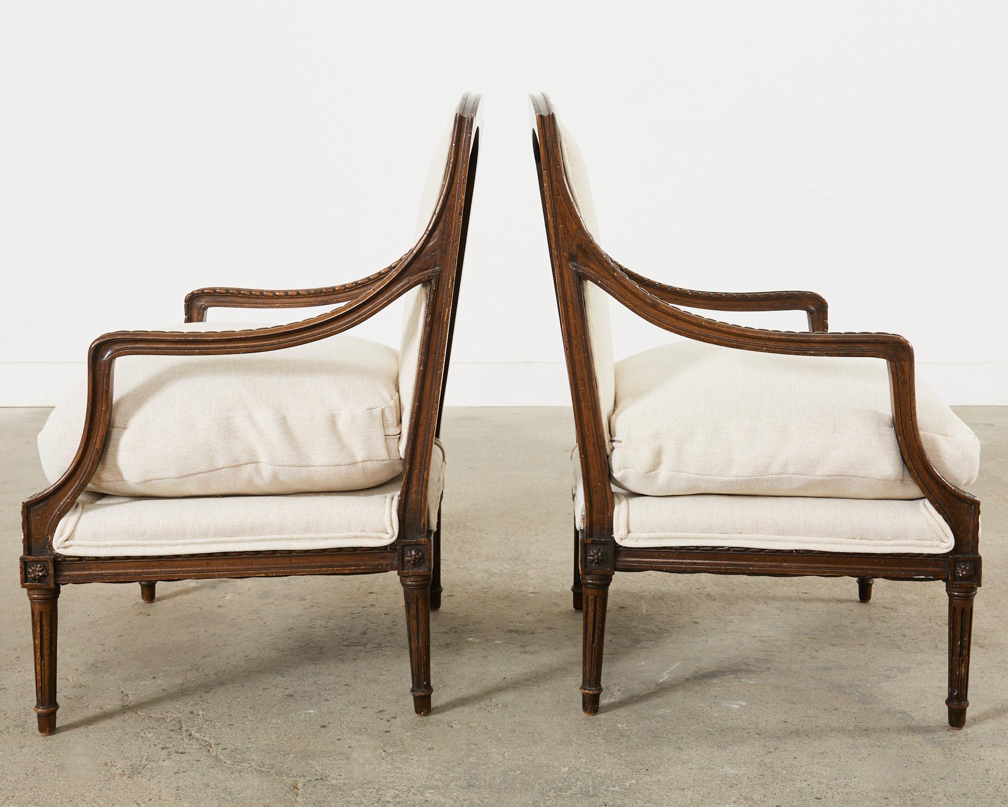 20th Century Pair of French Louis XVI Style Walnut Armchairs For Sale