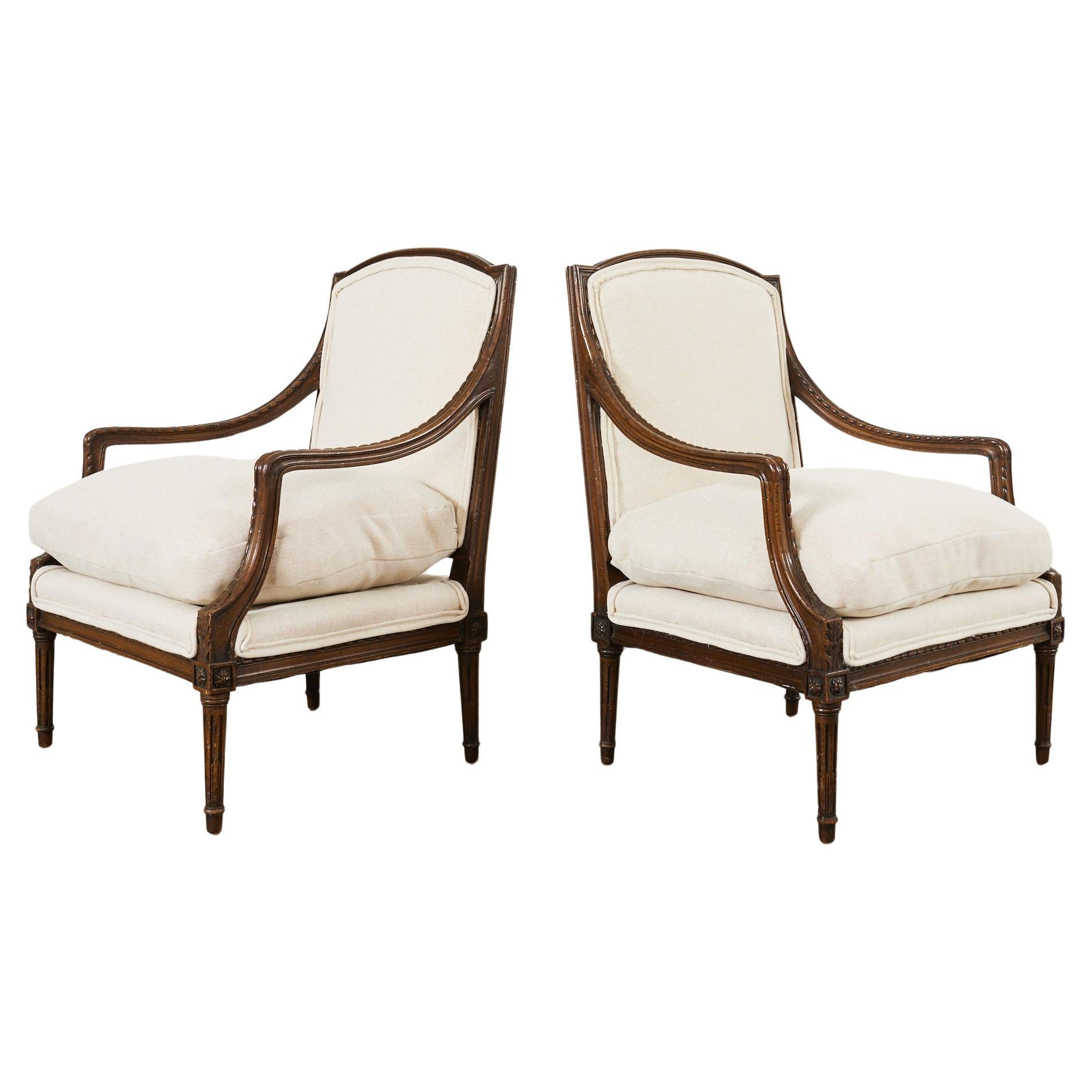 Pair of French Louis XVI Style Walnut Armchairs For Sale