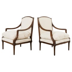 Antique Pair of French Louis XVI Style Walnut Armchairs