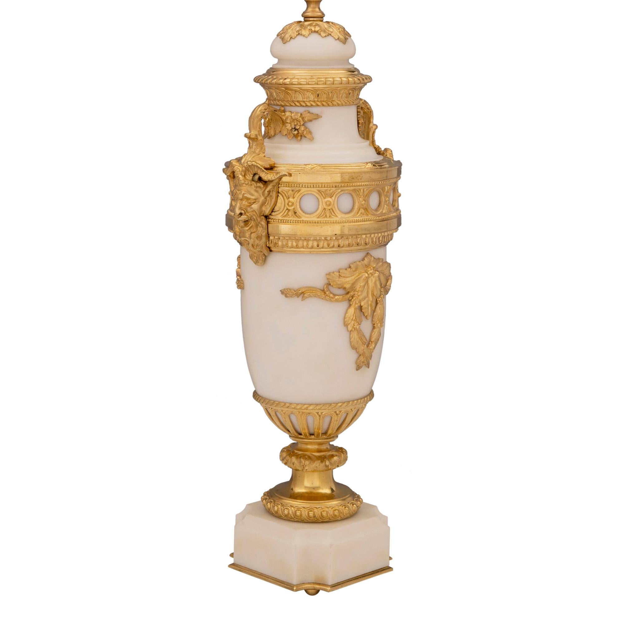 Pair of French Louis XVI Style White Carrara Marble and Ormolu Lamps In Good Condition For Sale In West Palm Beach, FL