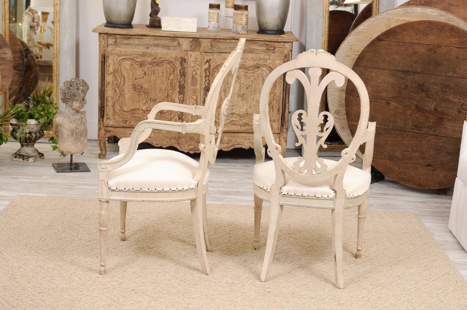 Pair of French Louis XVI Style White Painted Oval Back Armchairs with Upholstery In Fair Condition In Atlanta, GA