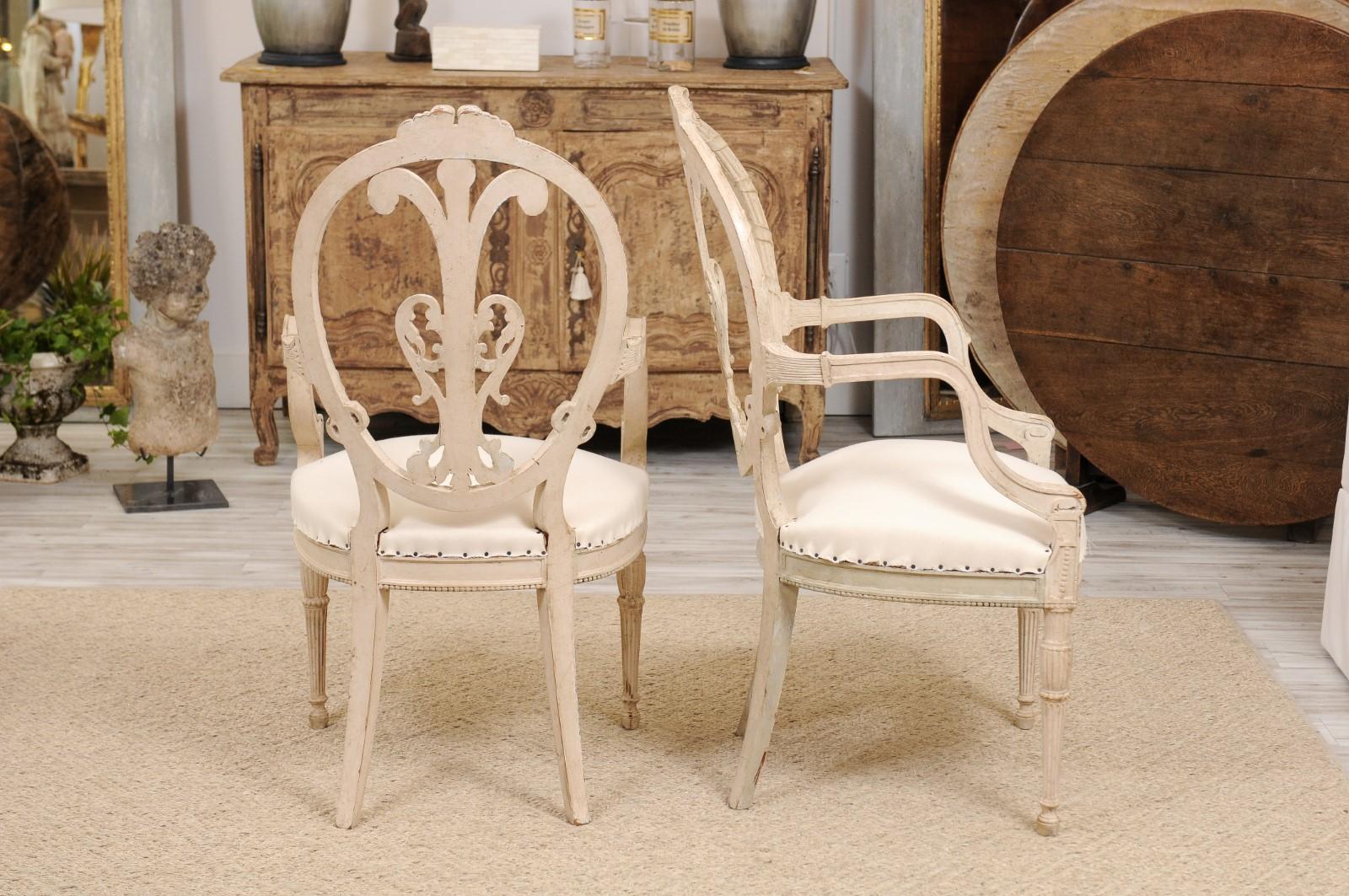 19th Century Pair of French Louis XVI Style White Painted Oval Back Armchairs with Upholstery