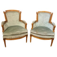 Pair of French Louis XVI Walnut Bergeres