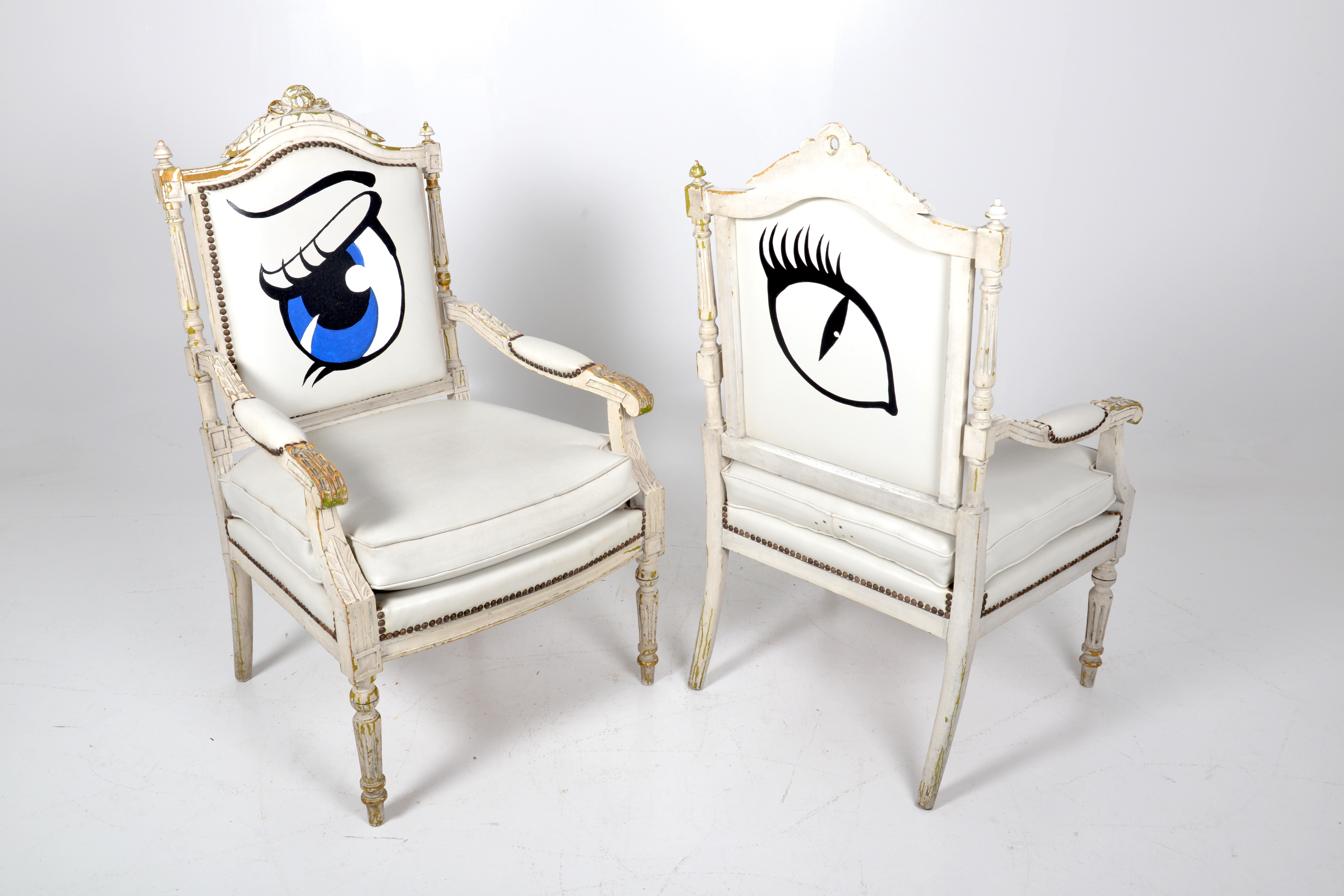 Pair of white painted french Louis XVIth revival armchairs, circa 1900.
Whimsical pair of French Louis XVI style or neoclassical fauteuil armchairs featuring a white painted frame. The square seat and back are supported by turned and fluted legs