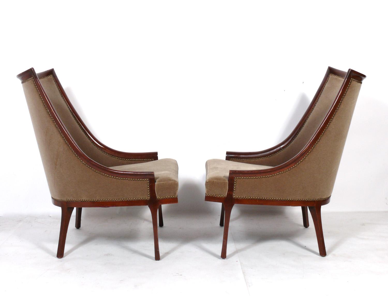 Pair of French Lounge or slipper chairs, France, circa 1960s. They are currently being refinished and reupholstered and can be completed in your choice of finish color and reupholstered in your fabric. Simply send us 8 yards of your fabric after