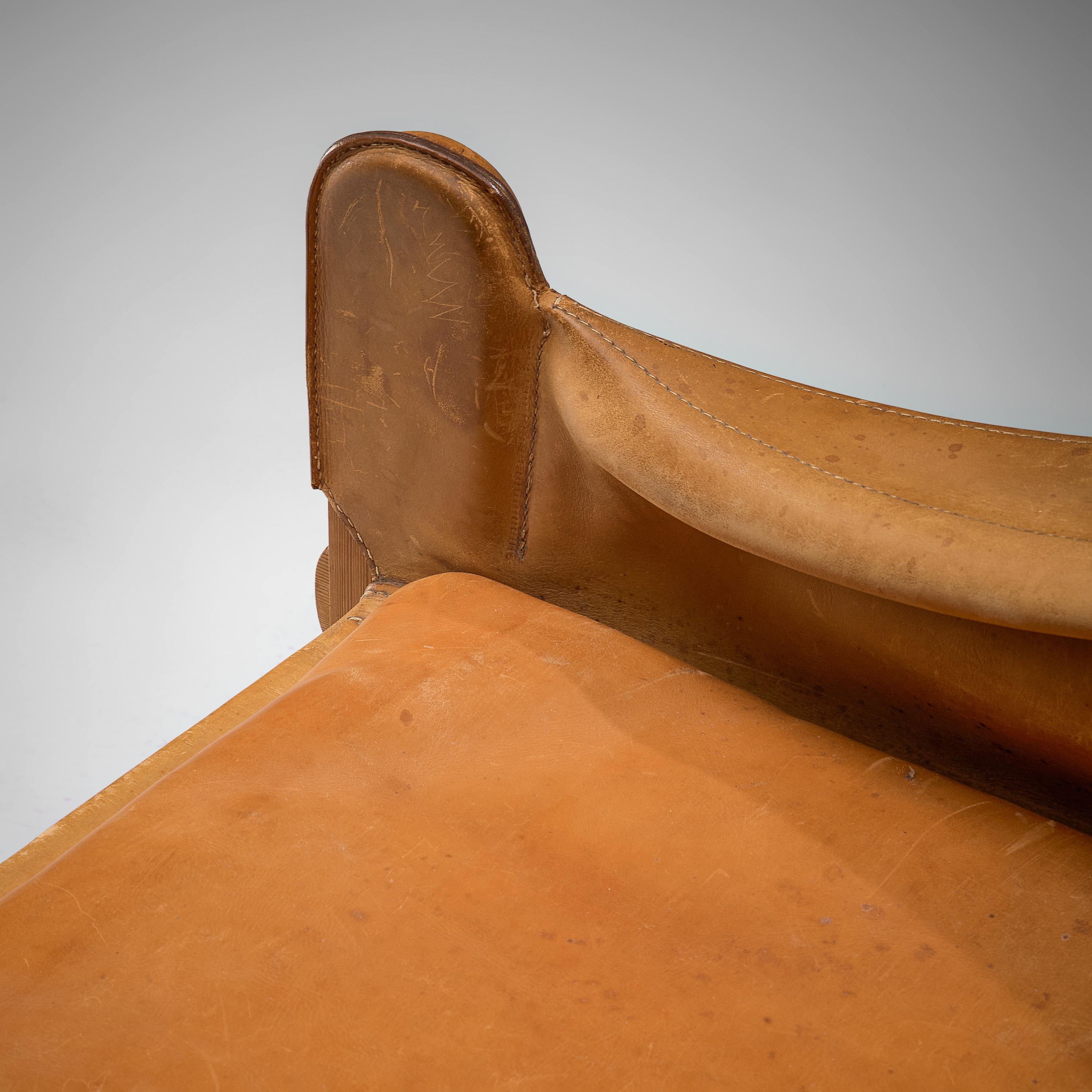 Mid-20th Century Pair of French Lounge Chairs in Cognac Leather