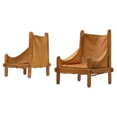 Pair of French Lounge Chairs in Patinated Cognac Leather