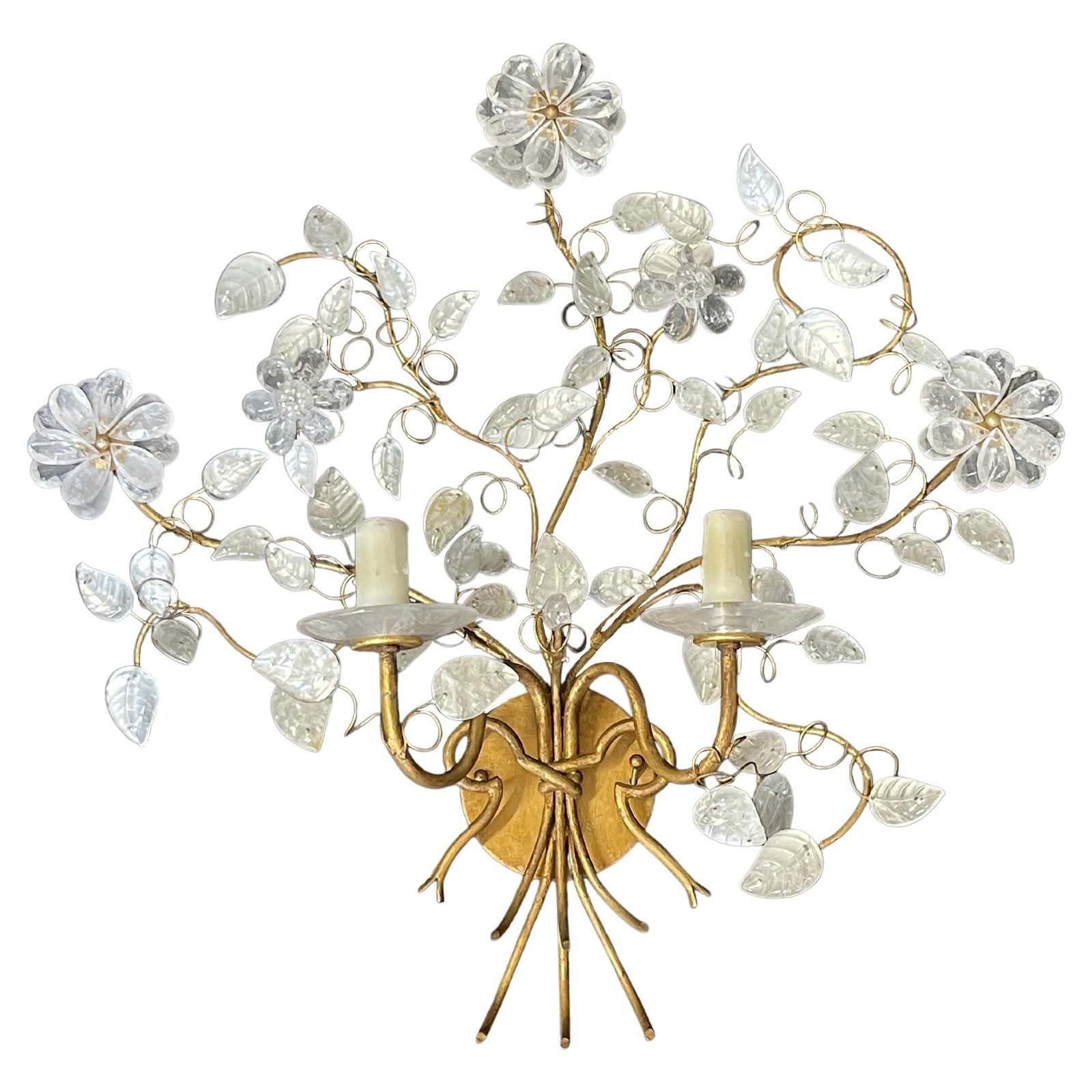 Pair of Maison Baguès sconces with rock crystal leaf and flower details, and rock crystal bobèches. Made with gilt metal base that take form of stems. Made in France, 20th Century.
*UL Listed
Dimensions:
24