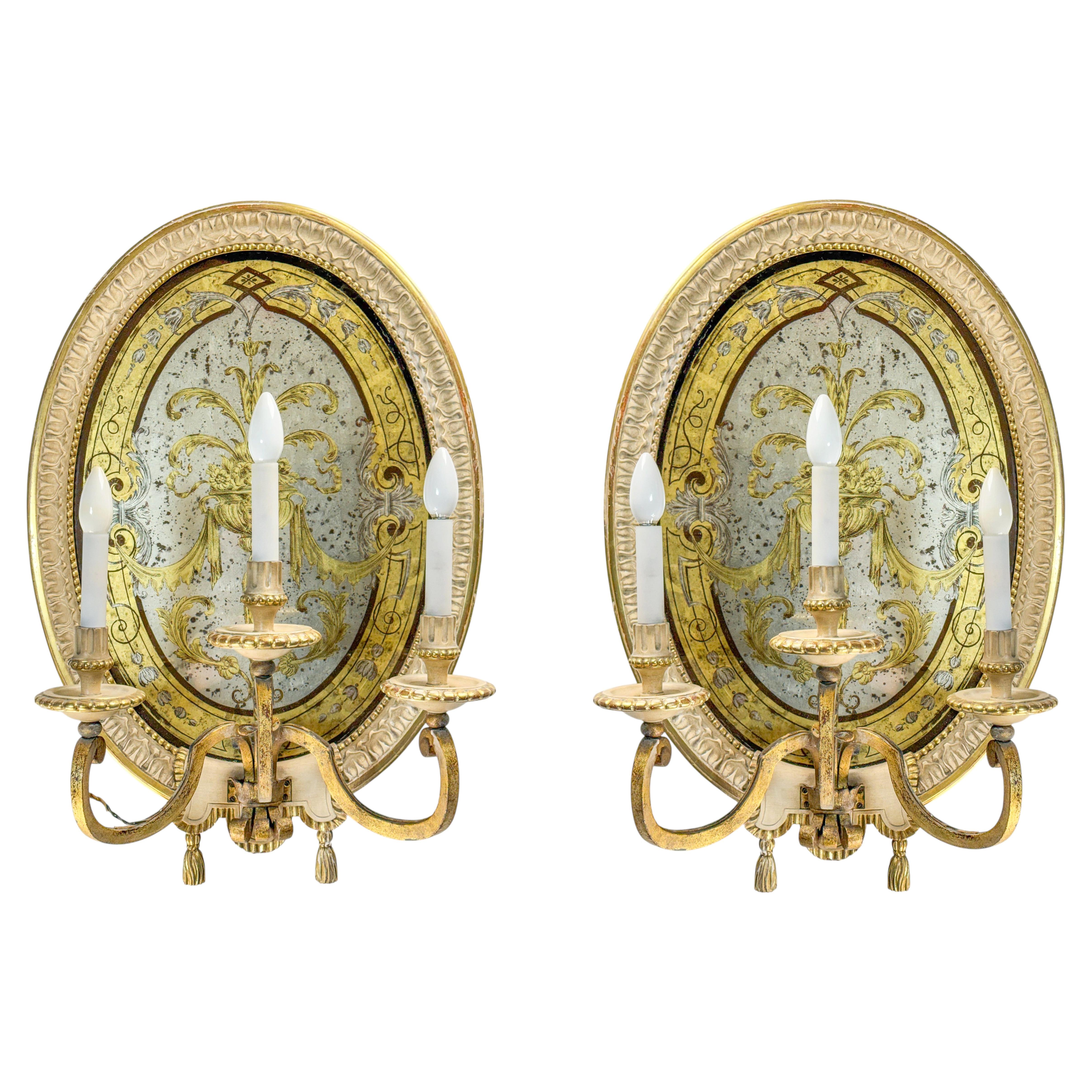 Paire d'appliques néoclassiques en bronze doré et miroir de la Maison Jansen (France)