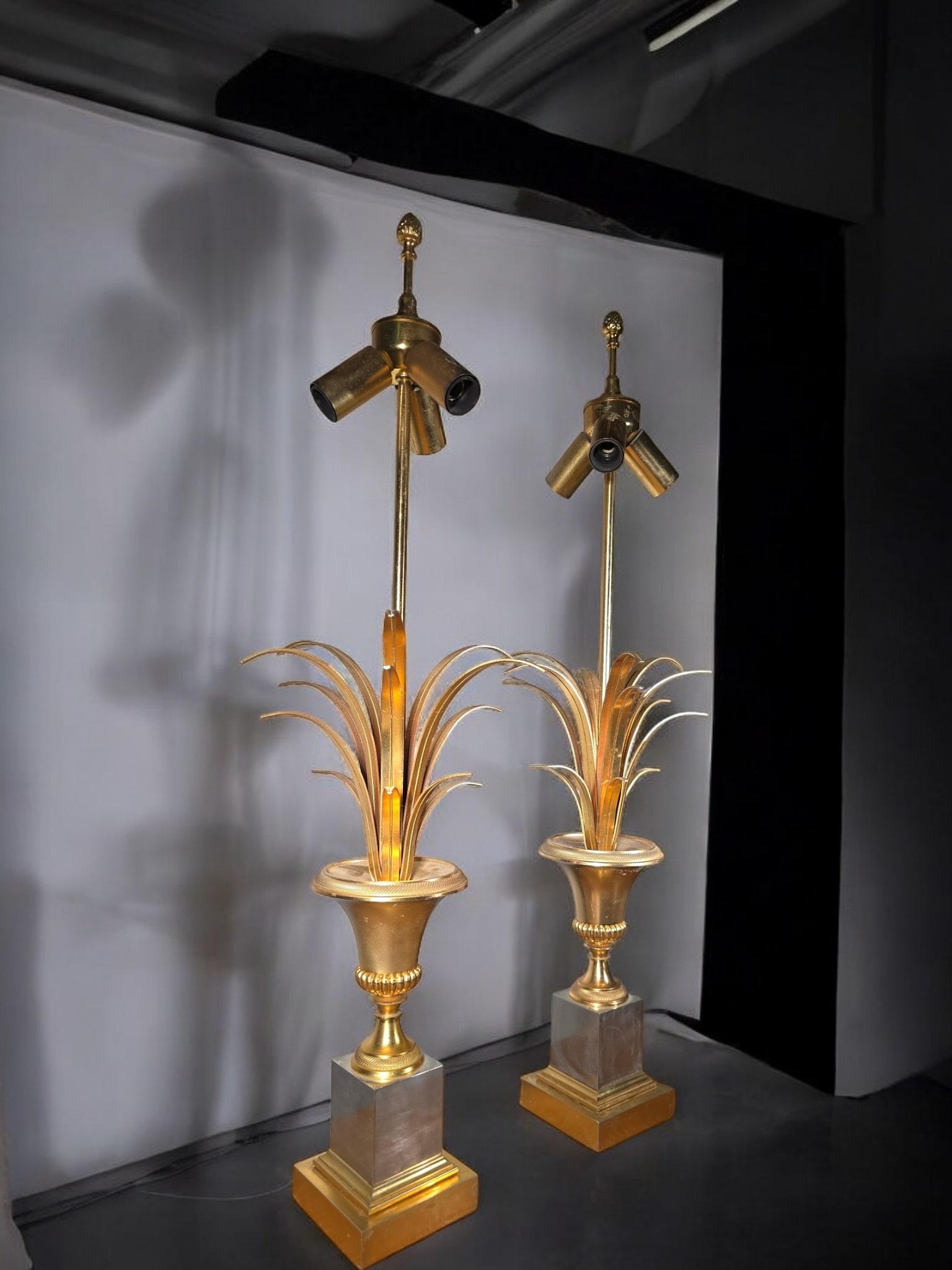 An elegant pair of table lamps by Maison Jansen, crafted in gilded brass and designed in the iconic pineapple motif. These lamps date to the 1970s and exude the timeless sophistication and luxurious flair characteristic of Maison Jansen's