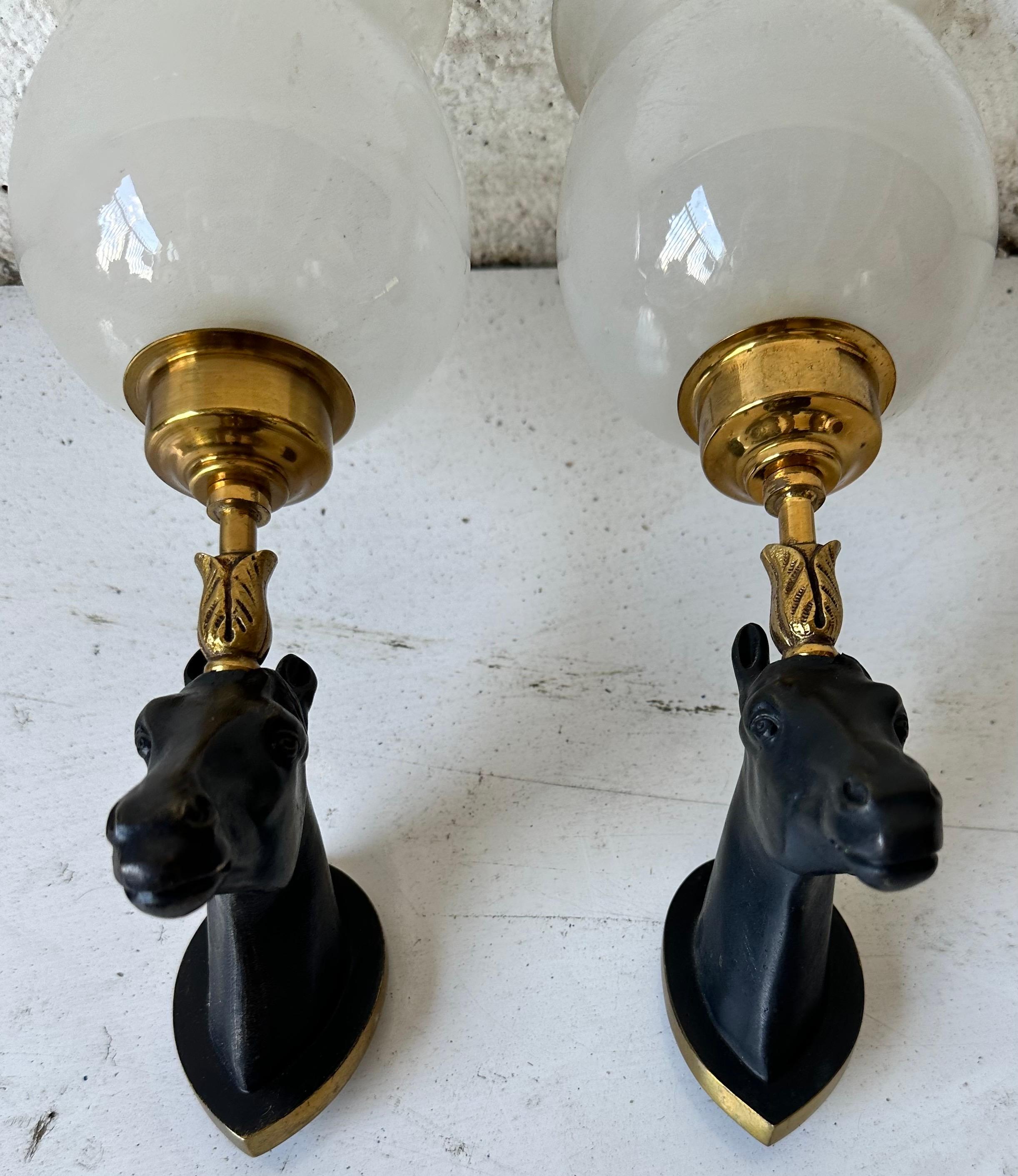 Coppia di lampade a cavallo in bronzo francesi della Maison Lancel