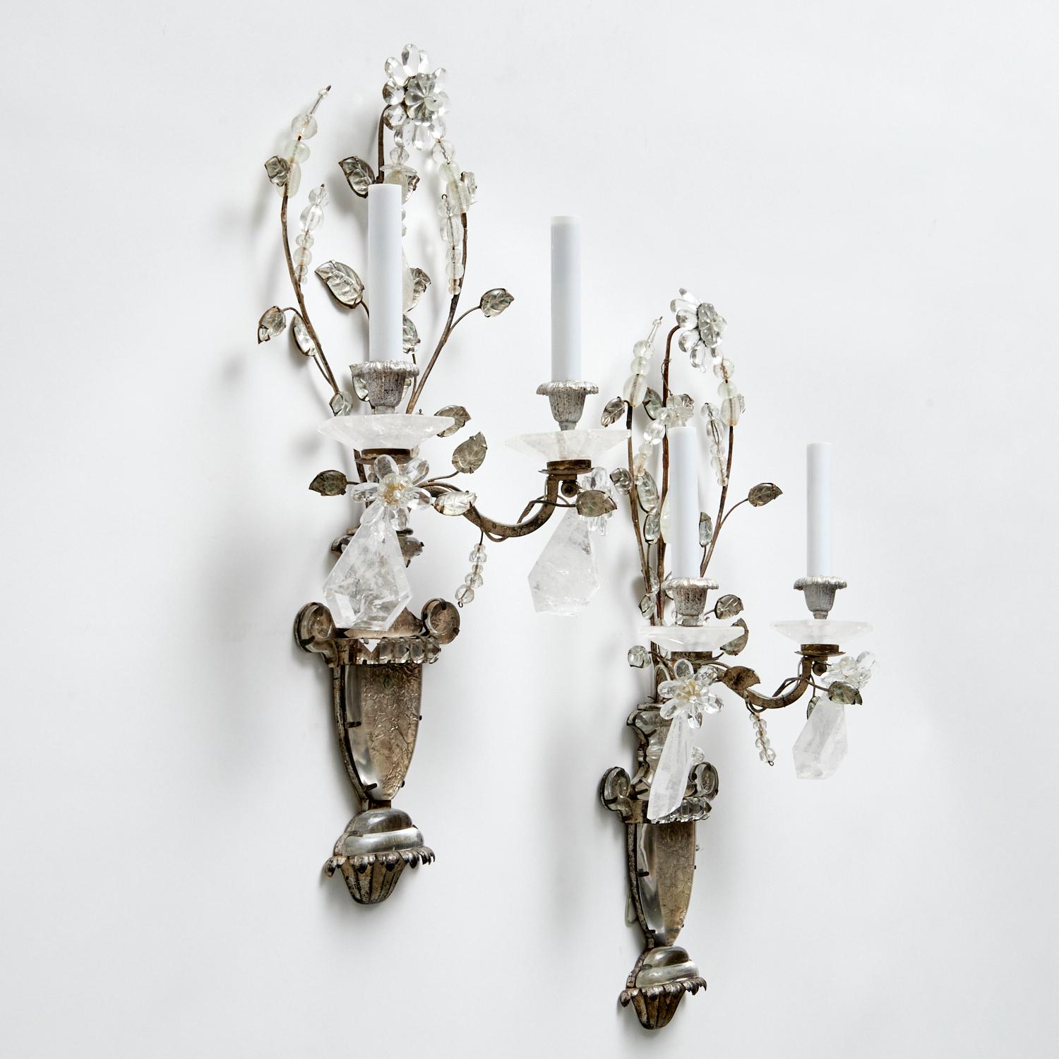 Gorgeous vintage pair of French MaisonBagues crystal rock and silver leaf sconces. Featuring an urn with flowers