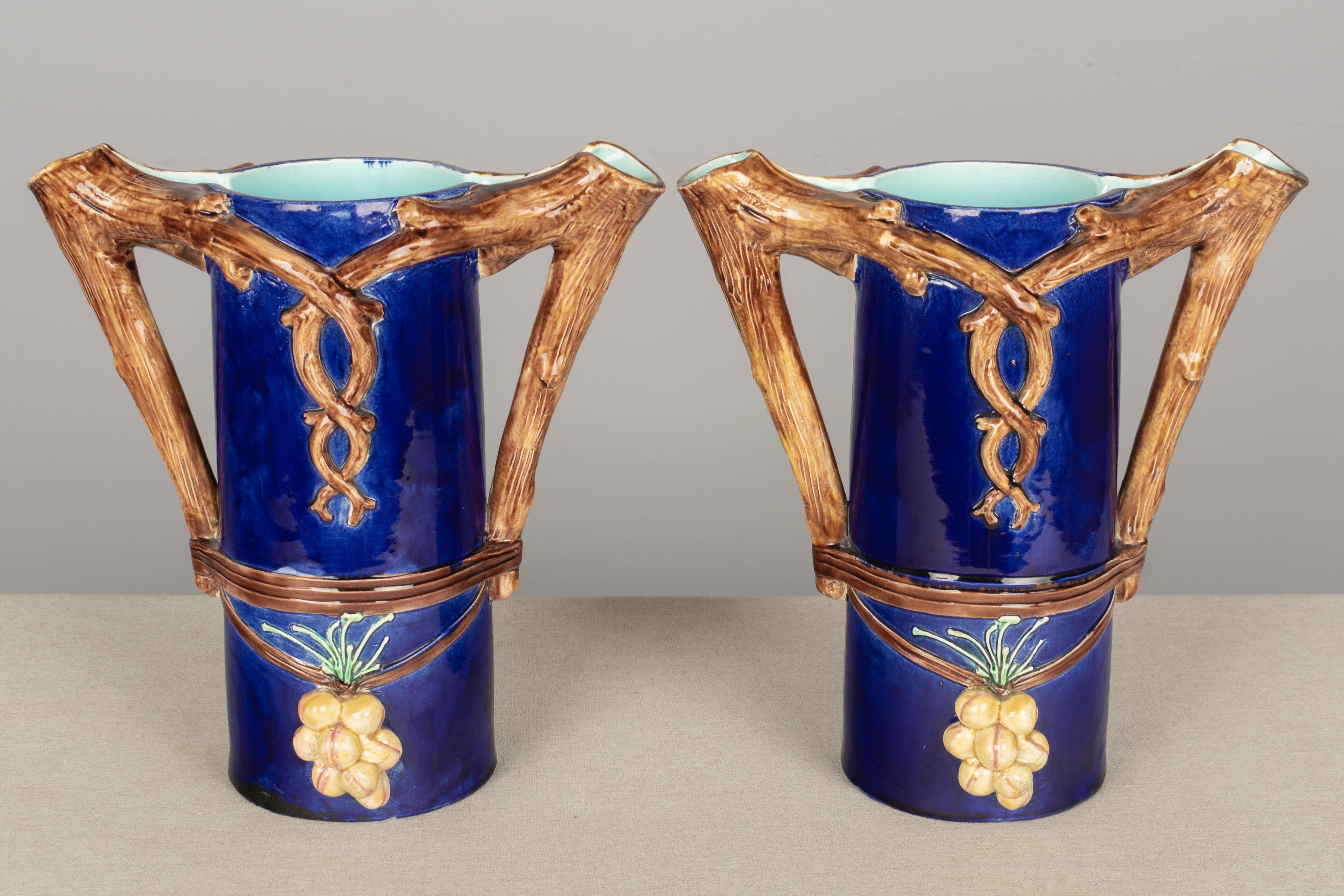 Hand-Crafted Pair of French Majolica Pitchers or Vases For Sale