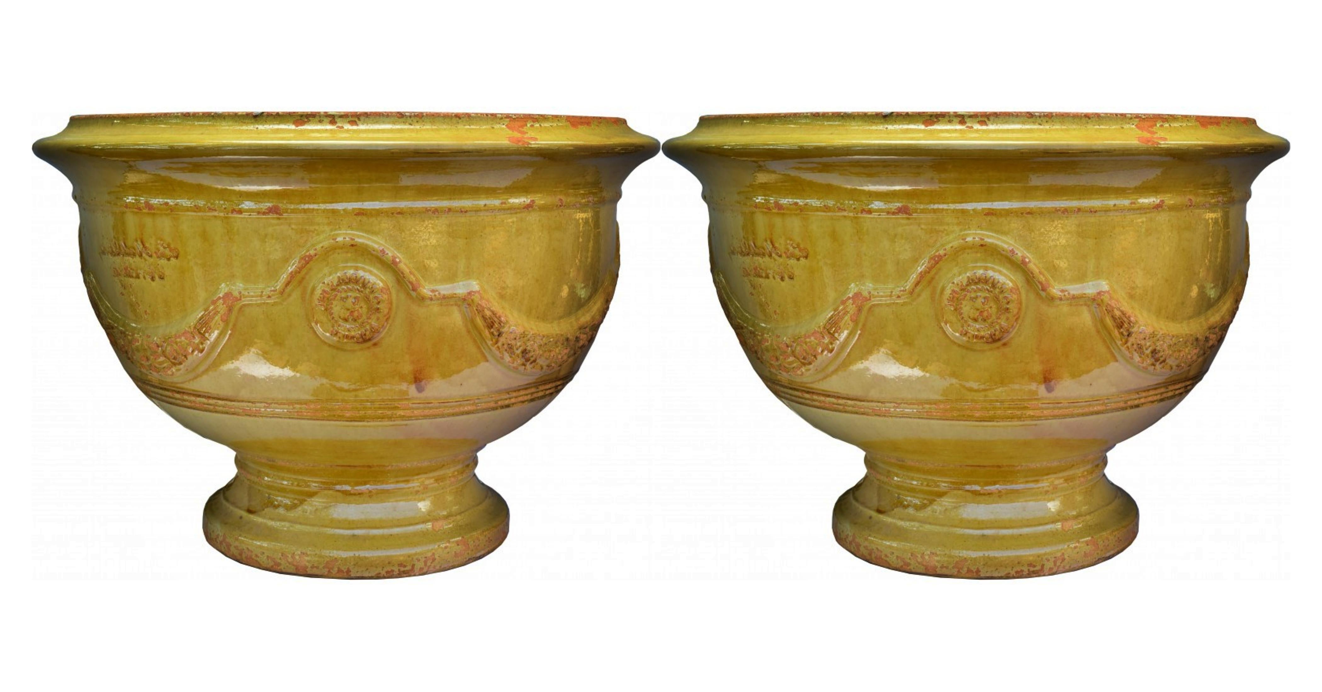 Pair of French Majolica vase from the Cévennes (France) early 20th Century

Anduze pots are an artisanal specialty of the Cevennes, a cultural region and mountain range in south-central France, located southeast of the Massif Central. It is a