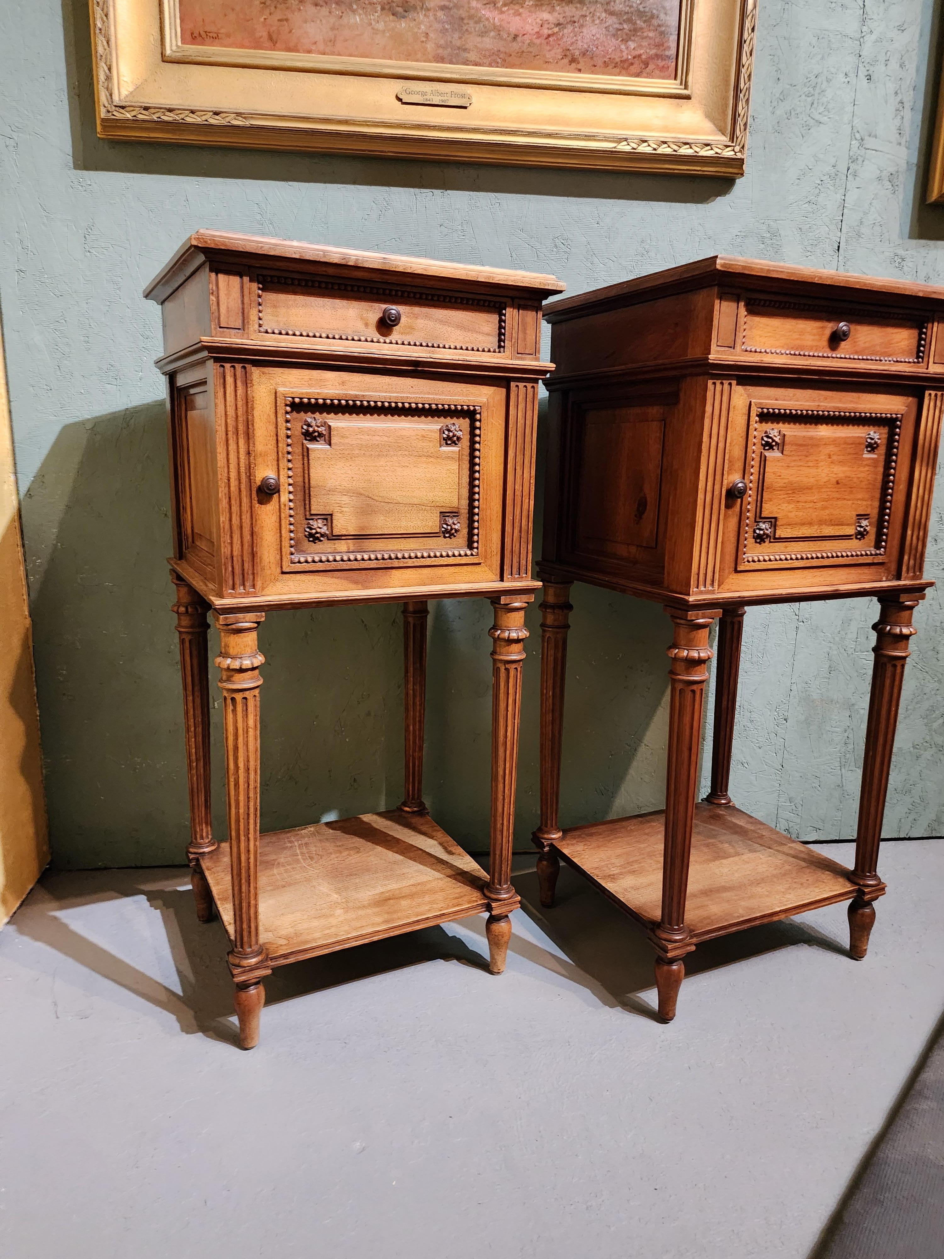 Handsome pair of french carved fruitwood nightstands. The tops are inset with beautiful rouge breche marble and the interior lined with marble as well.
Can we use as nightstands or could also be marvelous to place between windows as a place to