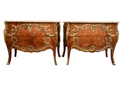 Pair Of French Marquetry Bombe Commodes With Specimen Marble Tops