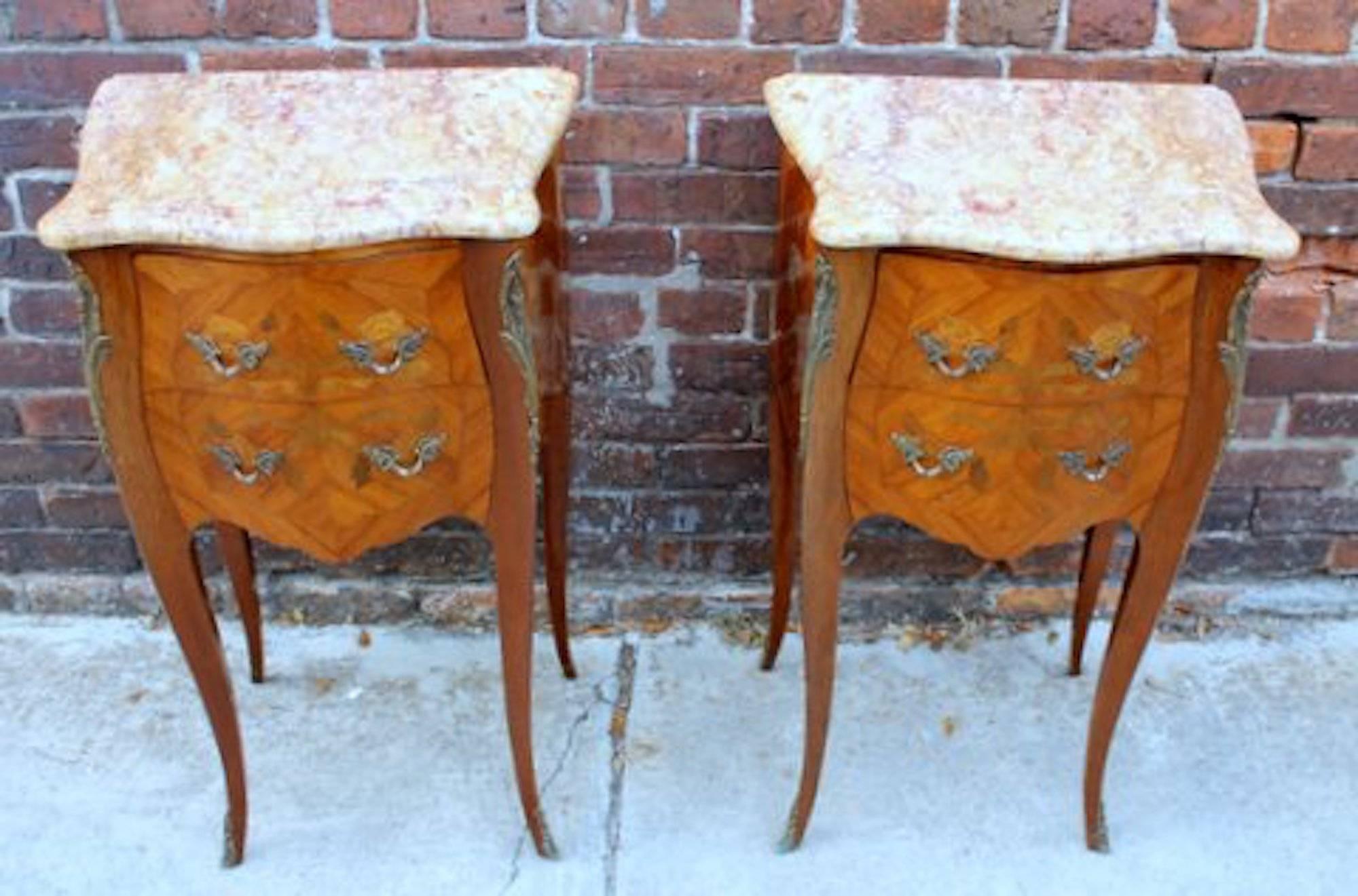 Pair of fabulous quality old French Louis XV style marquetry inlaid and ormolu-mounted two-drawer kingwood marble top chairside or bedside tables

Please note fabulous inlay in exotic woods and original, pristine marble tops. 

Measures: 15 1/2