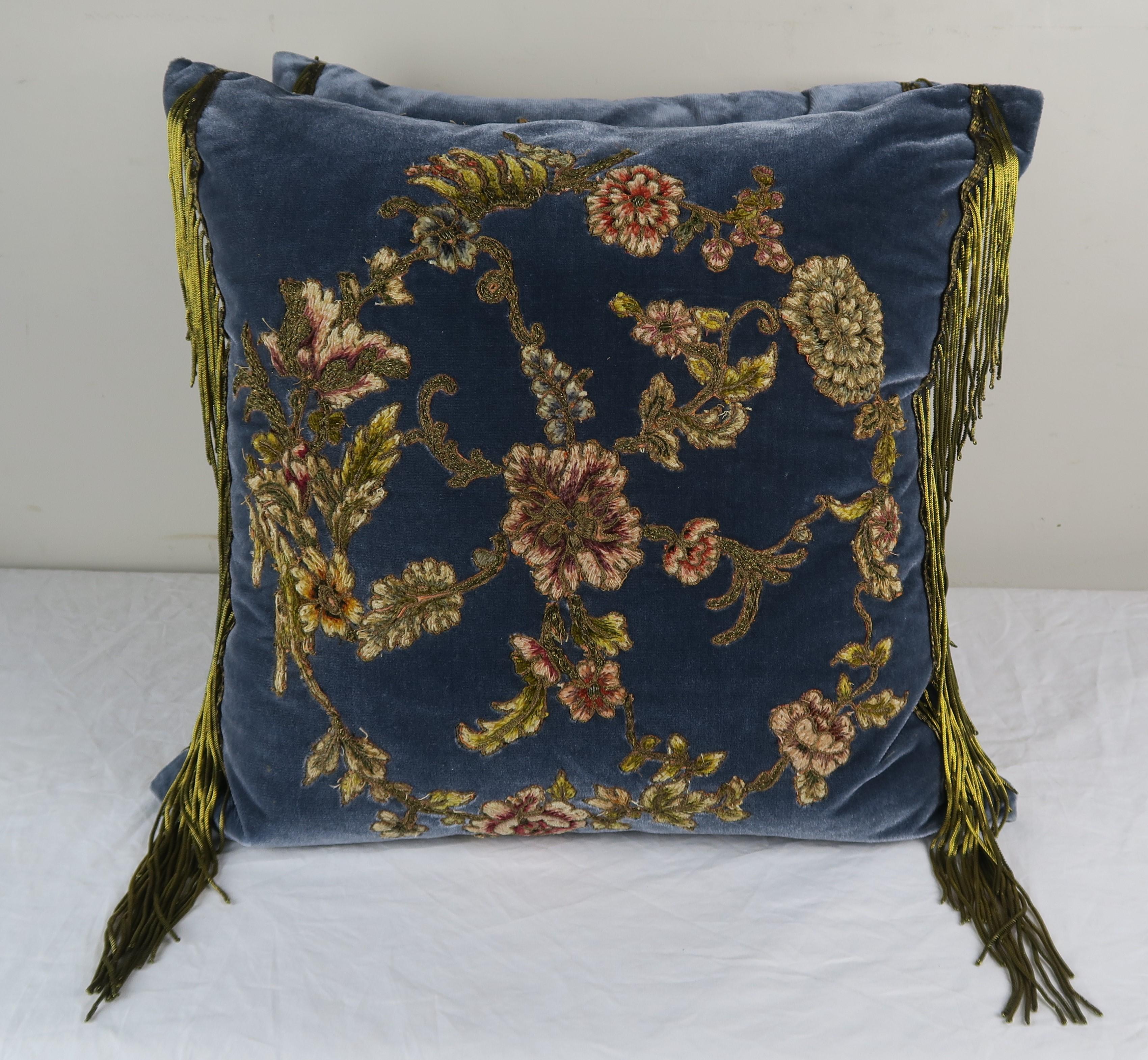 Pair of custom pillows designed by Melissa Levinson made with 19th century handmade metallic & chenille French embroideries appliqued to a deep blue silk velvet background. The embroideries depict pomegranites, roses, peonies, daisies and so much