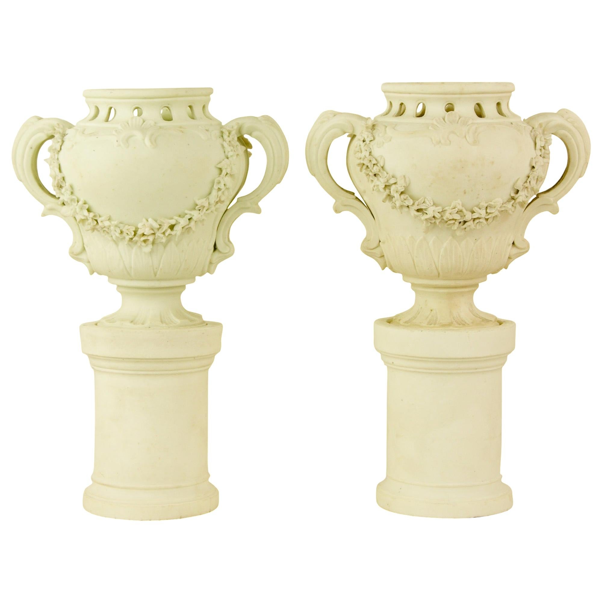 Pair of French Mid-18th Century Biscuit Porcelain Louis XV Vases and Pedestals