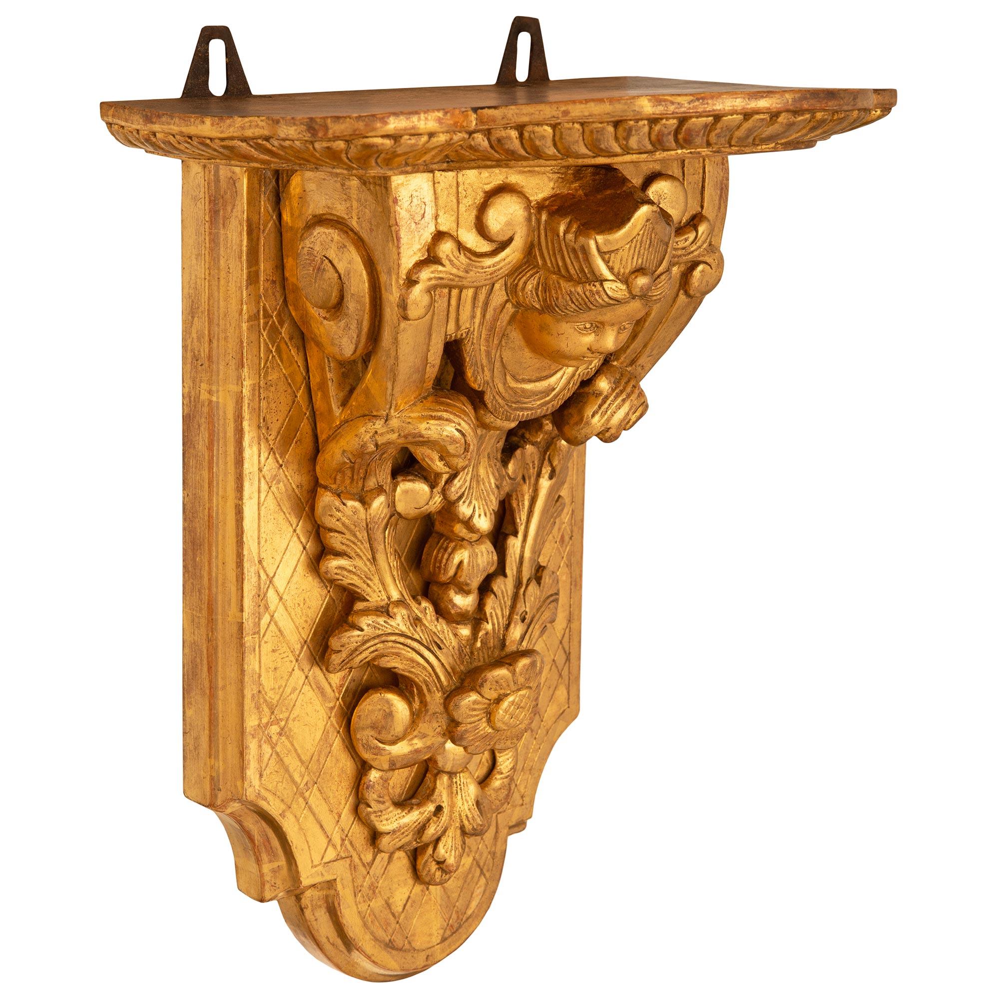 pair of French mid 18th century Regence Period Giltwood wall brackets In Good Condition For Sale In West Palm Beach, FL