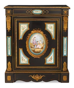 Pair of French Mid-19th C. Napoleon III Sevres-Mounted Ebonized Parlor Cabinets