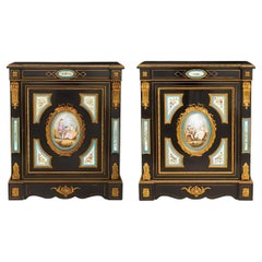 Pair of French Mid-19th C. Napoleon III Sevres-Mounted Ebonized Parlor Cabinets