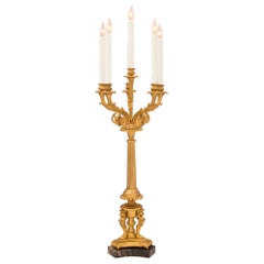 Pair of French Mid-19th Century Empire Style Ormolu Candelabras