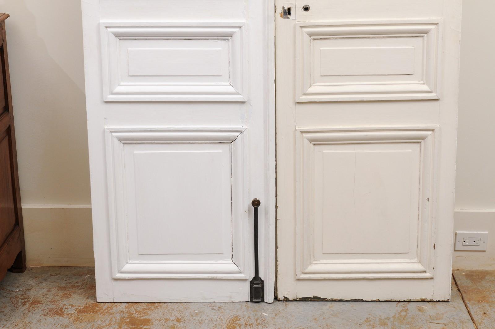 Pair of French Mid-19th Century Haussmann Painted Doors with Molded Panels In Good Condition In Atlanta, GA