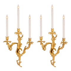 Pair of French Mid 19th Century Louis XV St. Ormolu Sconces