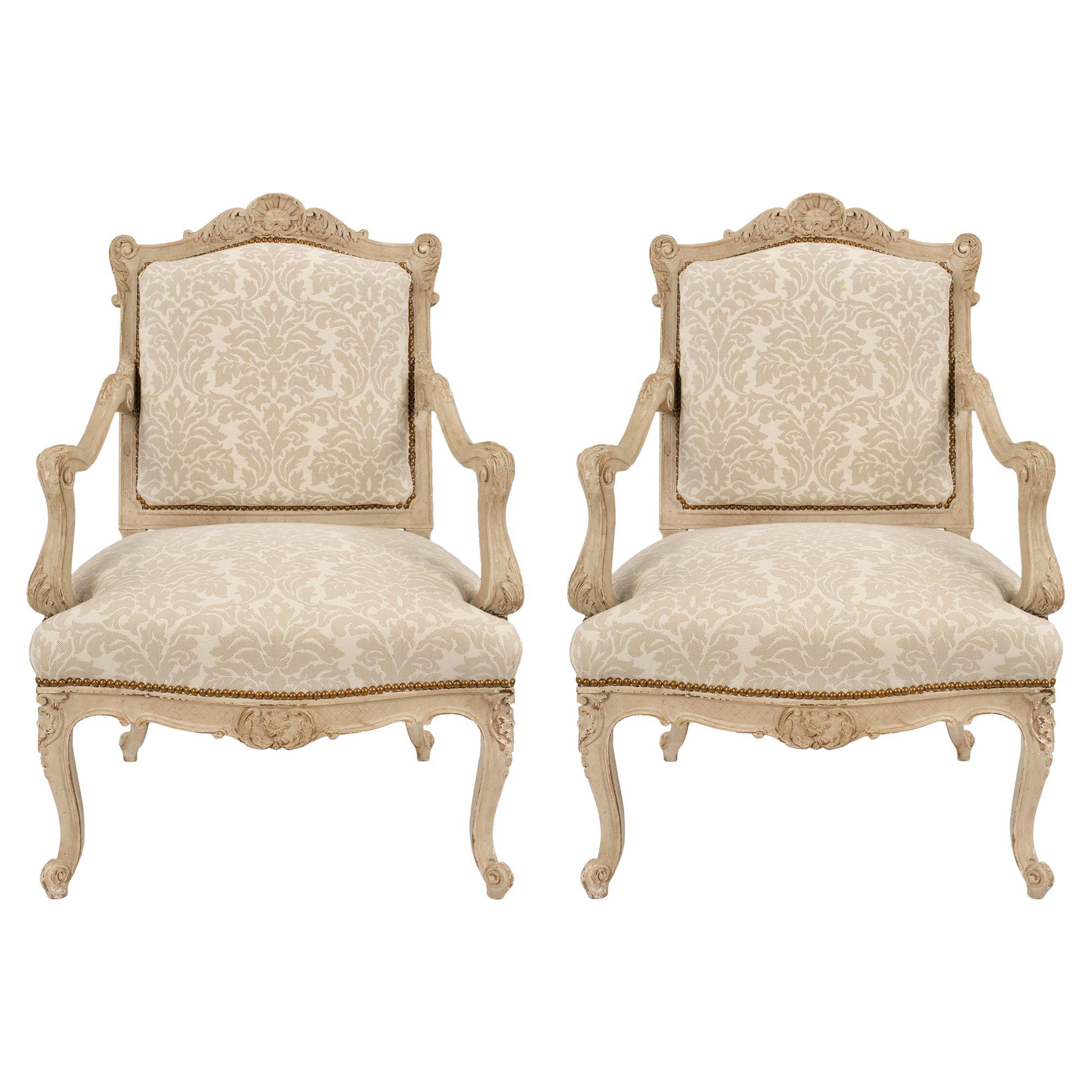 Pair of French Mid 19th Century Louis XV St. Patinated off White Armchairs