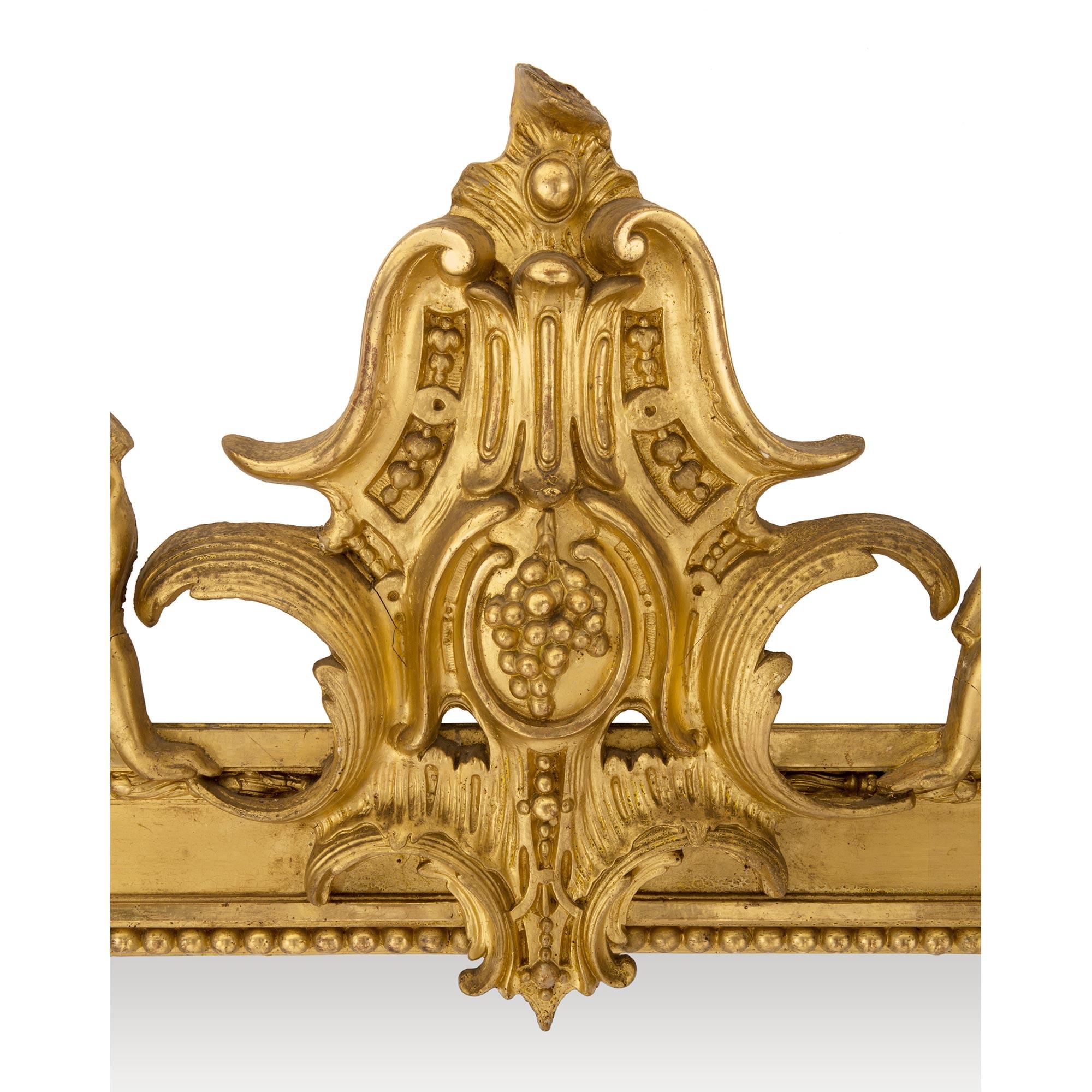 Miroir Paire de miroirs en bois doré de style Louis XVI du milieu du XIXe siècle français en vente