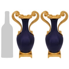 Pair of French mid 19th century Louis XVI st. Sèvres Porcelain and Ormolu vases