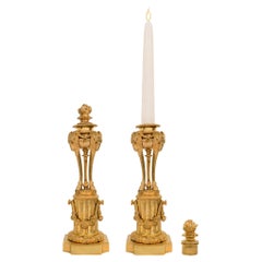 Pair of French Mid-19th Century Louis XVI Style Ormolu Candlesticks