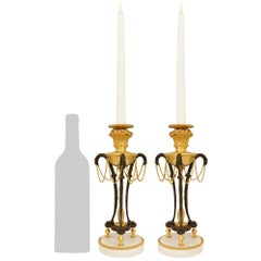 pair of French mid 19th century Ormolu, Bronze and Carrara marble candlesticks