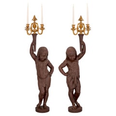 Pair of French Mid-19th Century Patinated Bronze and Ormolu Candelabra Statues