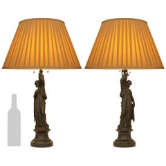 pair of French 19th century Neo-Classical st. patinated Bronze and marble lamps