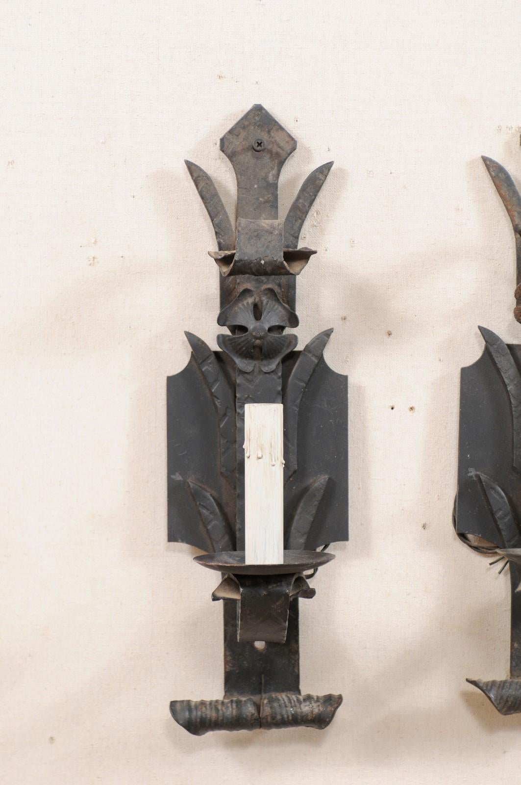 Patinated Pair of French Mid-20th Century Iron Sconces