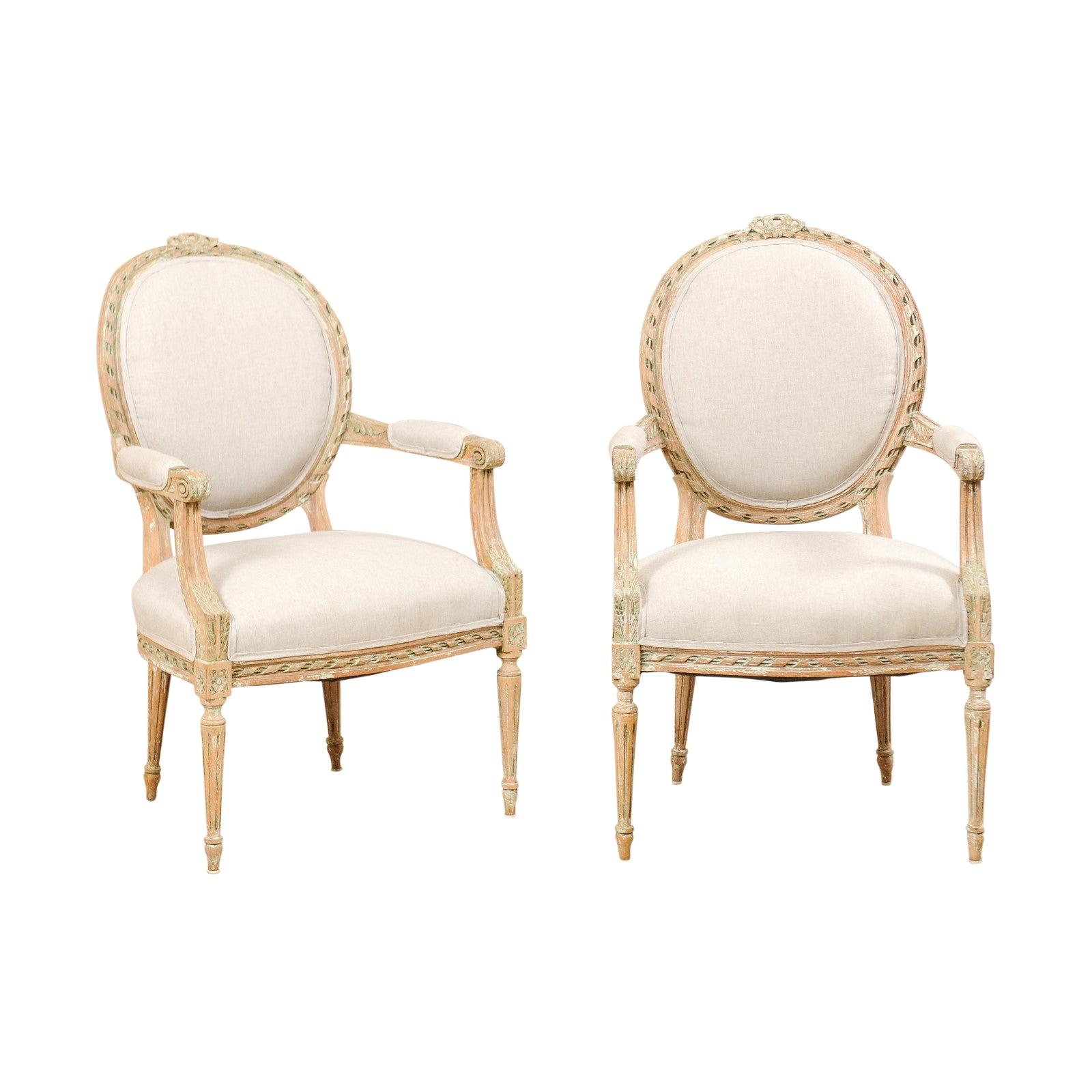 Pair of French Mid-20th Century Oval Back Armchairs with Nicely Carved Accents