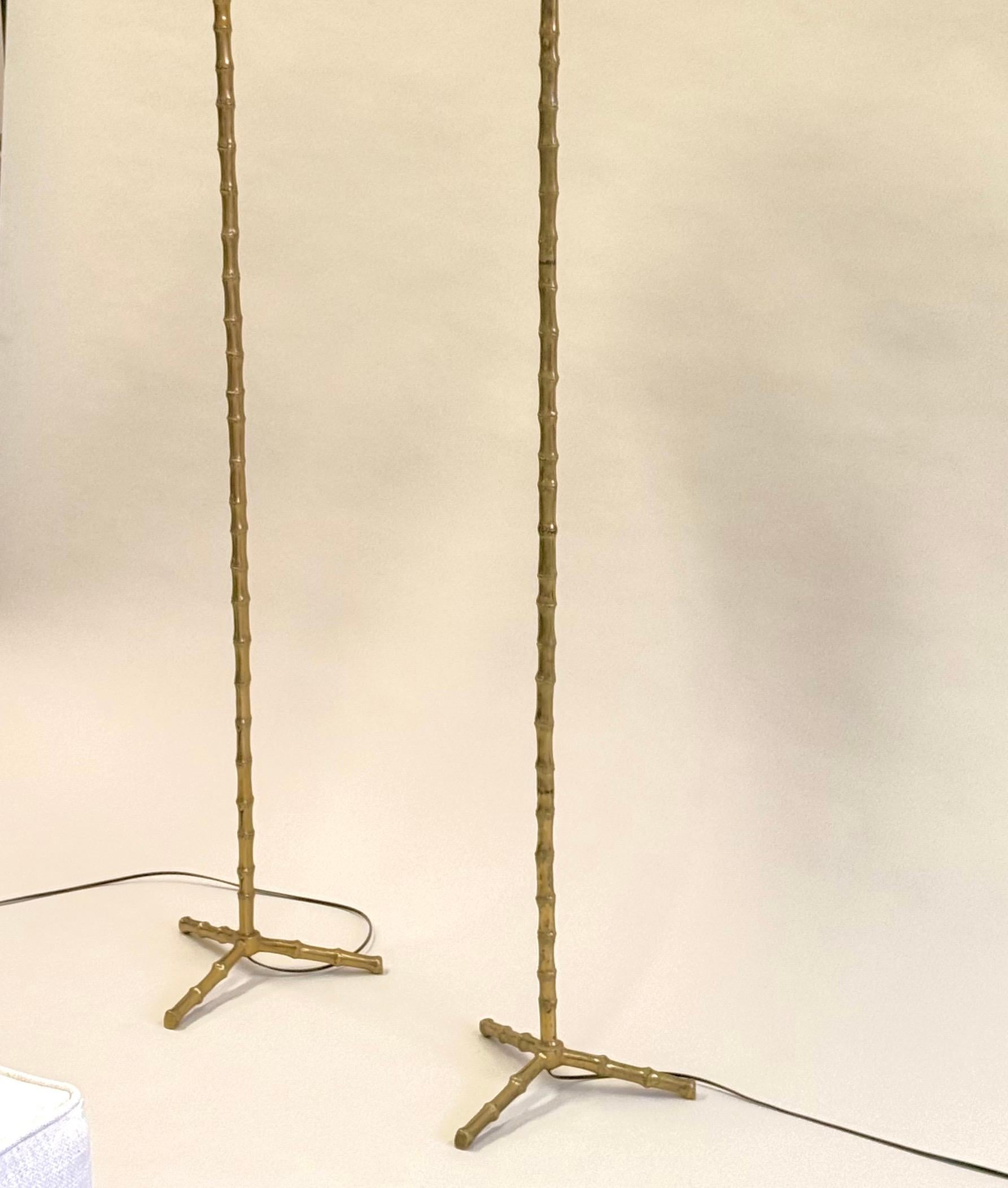 Hand-Crafted Pair of French Mid-Century Brass Faux Bamboo Floor Lamps by Maison Bagues For Sale